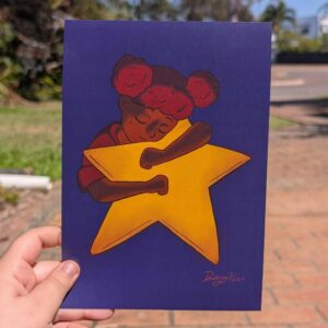A girl with curly hair and dark skin wairing hugs a glowing star peacfuly against a blue background.